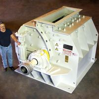 White slugger crusher hammer mill for applications that require a large feed opening - Williams Patent Crusher